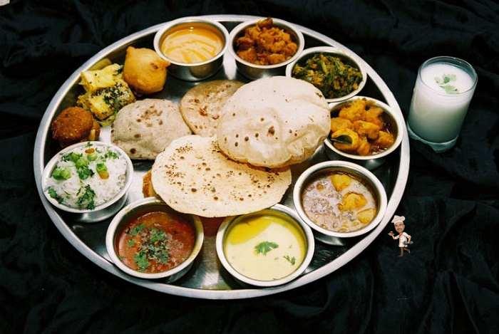 gujarati-cuisine-a-rich-blend-of-different-flavours-served-on-a-thali